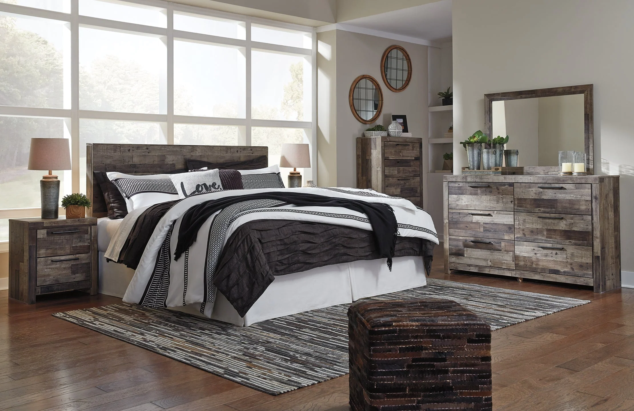 Derekson King Panel Headboard with Mirrored Dresser, Chest and Nightstand - Image 11